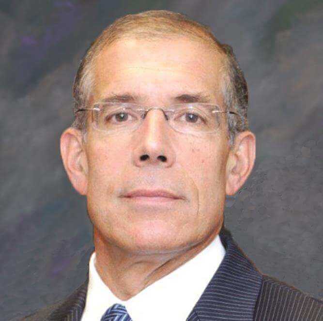 Hon. Peter B. Skelos. Hearing Officer for NAM (National Arbitration and Mediation) with name written under picture
